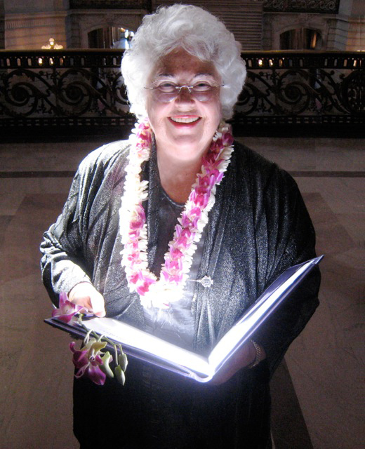 photo: Judith Skutch Whitson, sunlit book, floral necklace